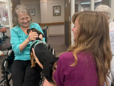 Four-legged visitors bring smiles to Bishop Noa Home